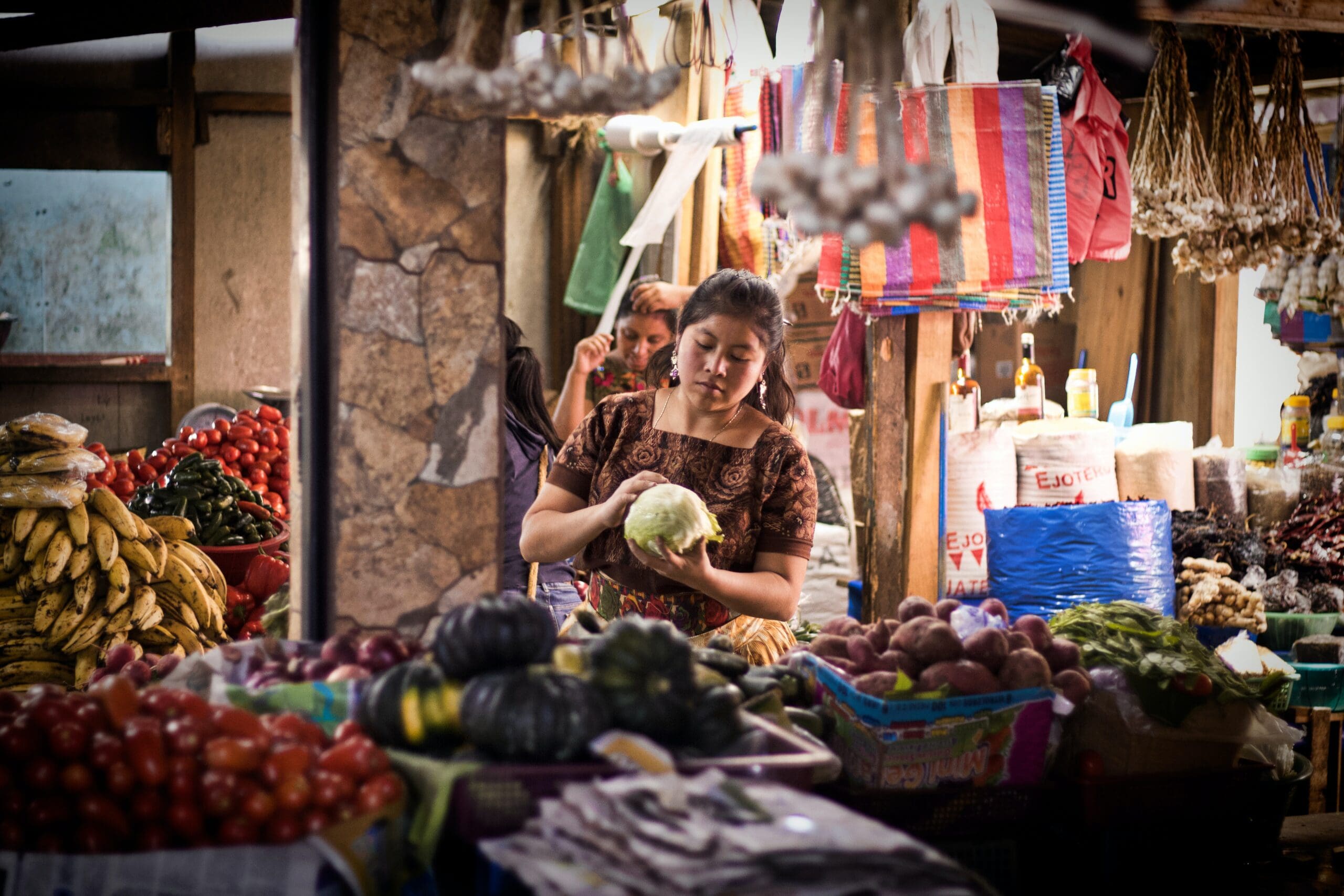 Mayan woman selling fruit at the Chichicastenango market.