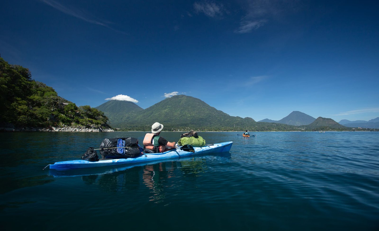 Kayaking experience on Lake Atitlán with mountain scenery