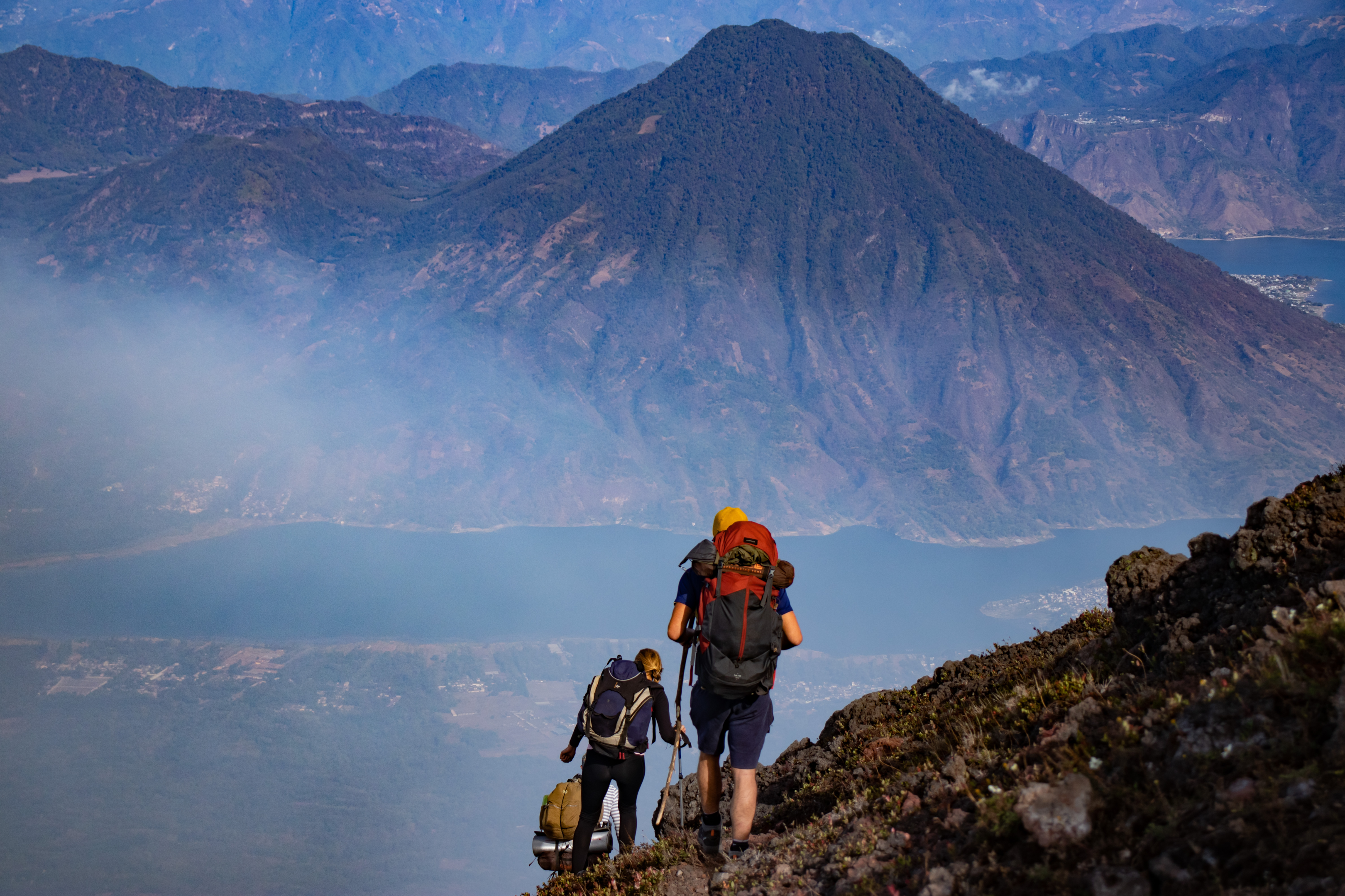 Hikers just above the clouds of Volcan Atitlan.