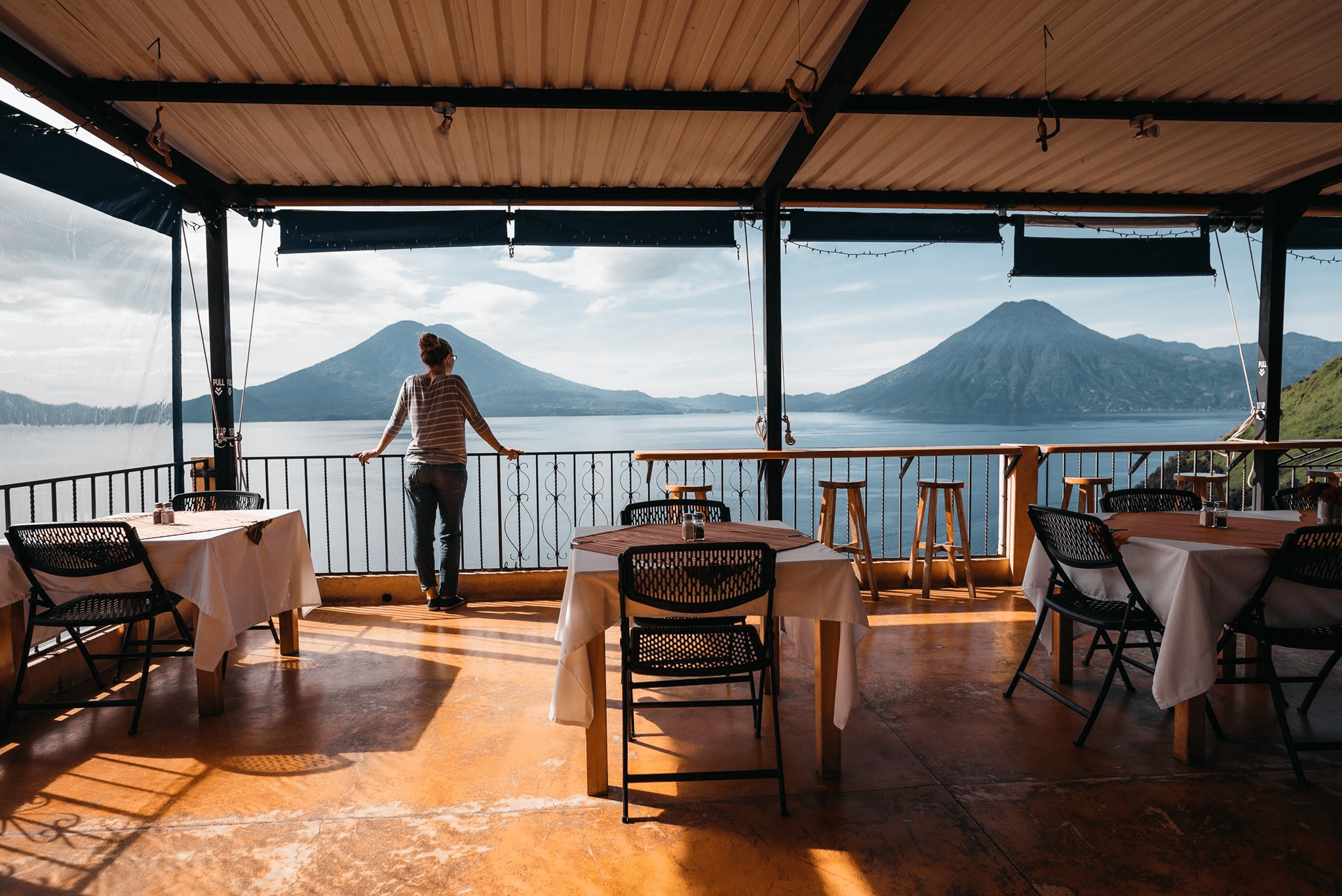 The view of Lake Atitlan and its surrounging volcanoes at Café Sabor Cruceño