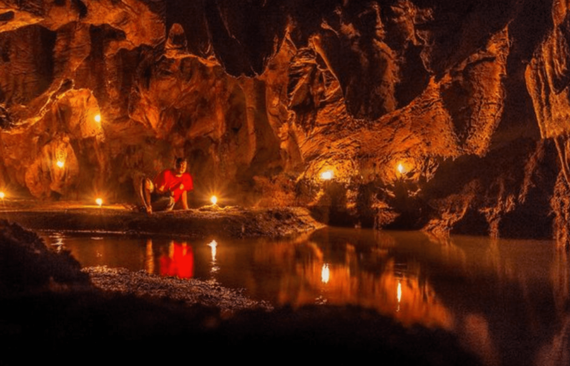 exploring the K'anba Caves by candlelight