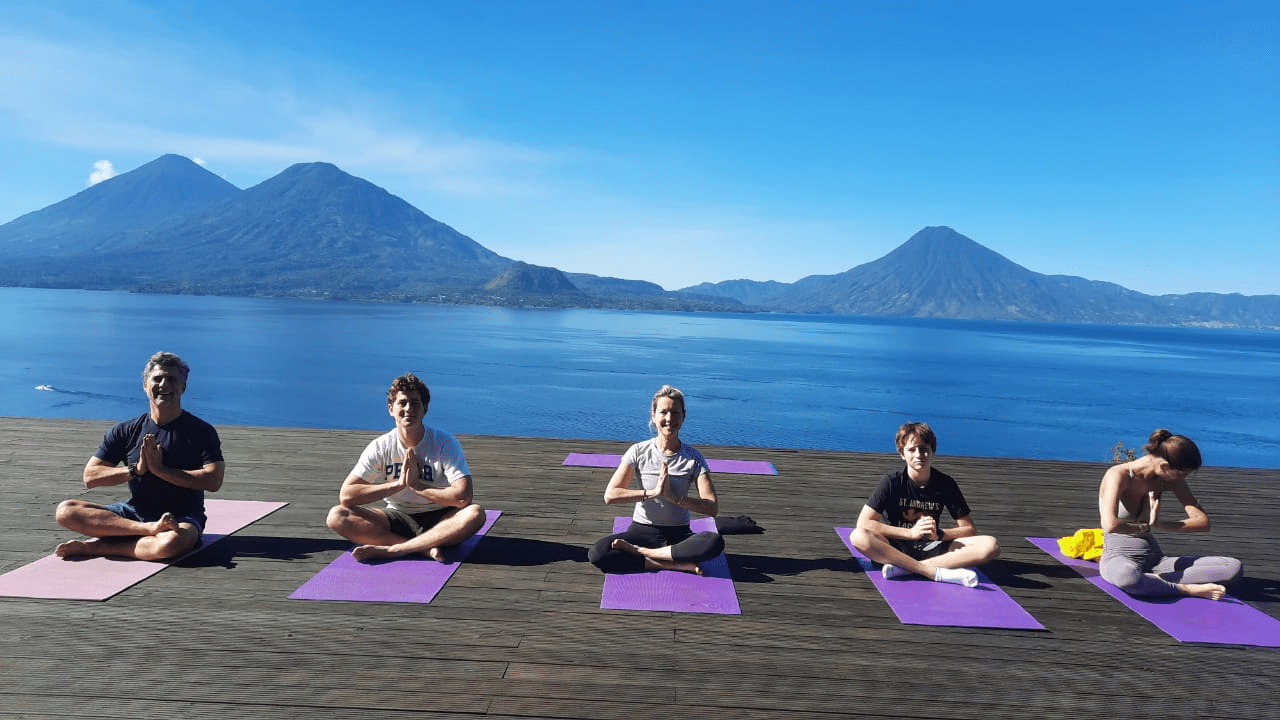 Yoga practicioners enjoying a morning yoga class.